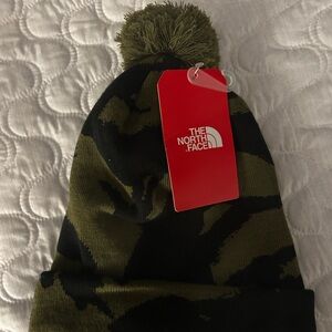 North Face toboggan type knit hat with lining. New with tags.